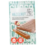 Max Brenner: טבלת שוקולד חלב ממולא בקרם נוגט עם שברי אגוזי לוז קלויים